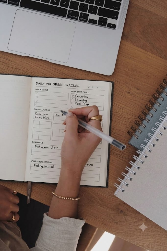 Open planner with handwritten project goals